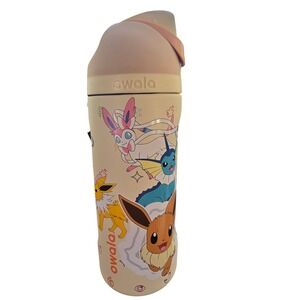 Owala FreeSip 16oz Pokemon Eevee Evolutions Insulated Water Bottle Cream In Hand